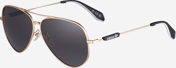 ADIDAS ORIGINALS - Gafas de sol en oro: frente