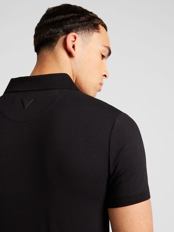 GUESS Poloshirt 'NOLAN' in Schwarz