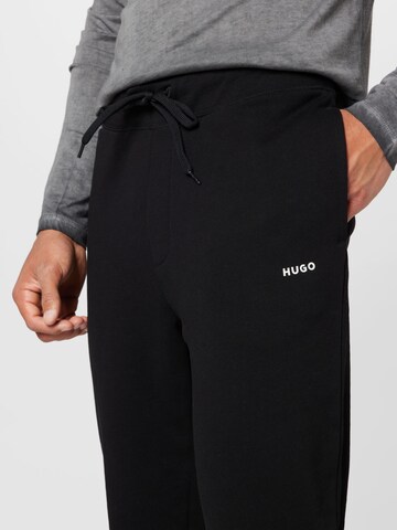 HUGO Red - Tapered Calças 'Dayote' em preto