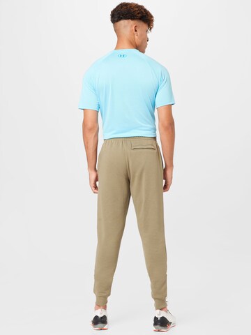 UNDER ARMOUR Tapered Sports trousers 'Rival' in Green