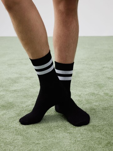 ABOUT YOU x Rewinside Socks 'Timo' in Black