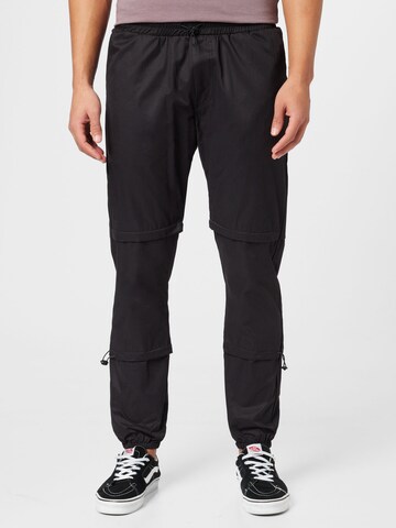 BURTON MENSWEAR LONDON Regular Trousers in Black: front