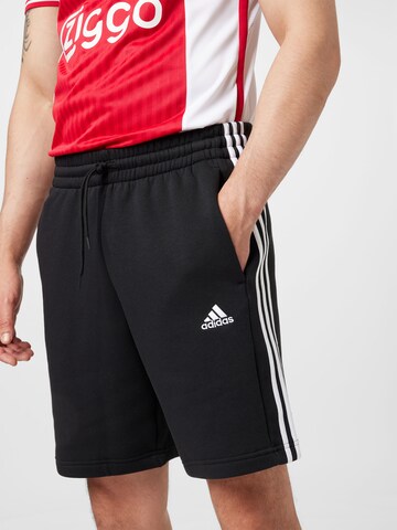 ADIDAS SPORTSWEAR Normalny krój Spodnie sportowe 'Essentials' w kolorze czarny