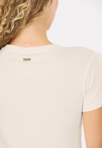 Athlecia Performance shirt 'Tinashe' in Beige