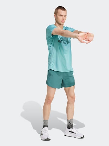 ADIDAS PERFORMANCE - Loosefit Pantalón deportivo 'RUN IT' en verde: frente