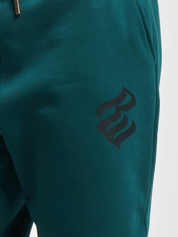 ROCAWEAR Loose fit Trousers in Blue