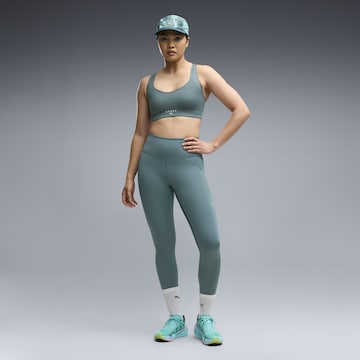 PUMA Skinny Sportbroek 'Puma x Hyrox Pwrmode' in Groen