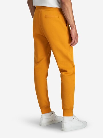 A-dam Regular Broek 'LUCA' in Oranje