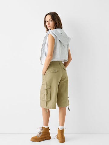 Bershka Wide Leg Gargohousut värissä vihreä