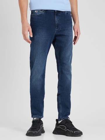 Tommy Jeans Regular Farkut 'SIMON' värissä sininen: edessä