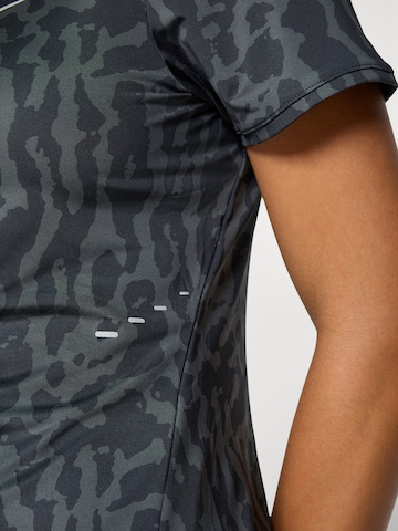 T-shirt fonctionnel 'SWIFT' NIKE en noir