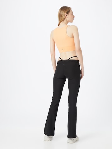 évasé Pantalon Karl Kani en noir