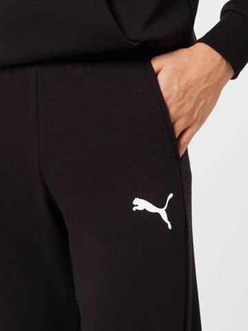 PUMA Tapered Sporthose in Schwarz