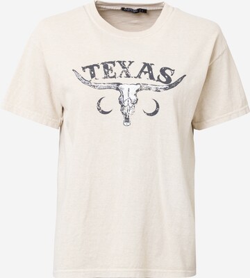 Tricou supradimensional 'Texas' de la Nasty Gal pe bej: față