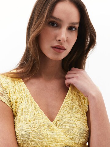 Haut OXXO en jaune
