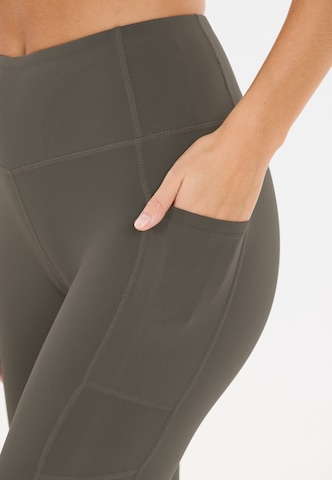 Athlecia Skinny Sportbroek 'Elli' in Bruin
