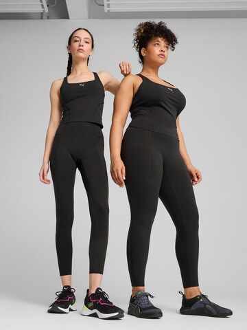 PUMA Skinny Sports trousers in Black: front