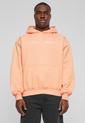 Sweat-shirt Karl Kani en orange : devant