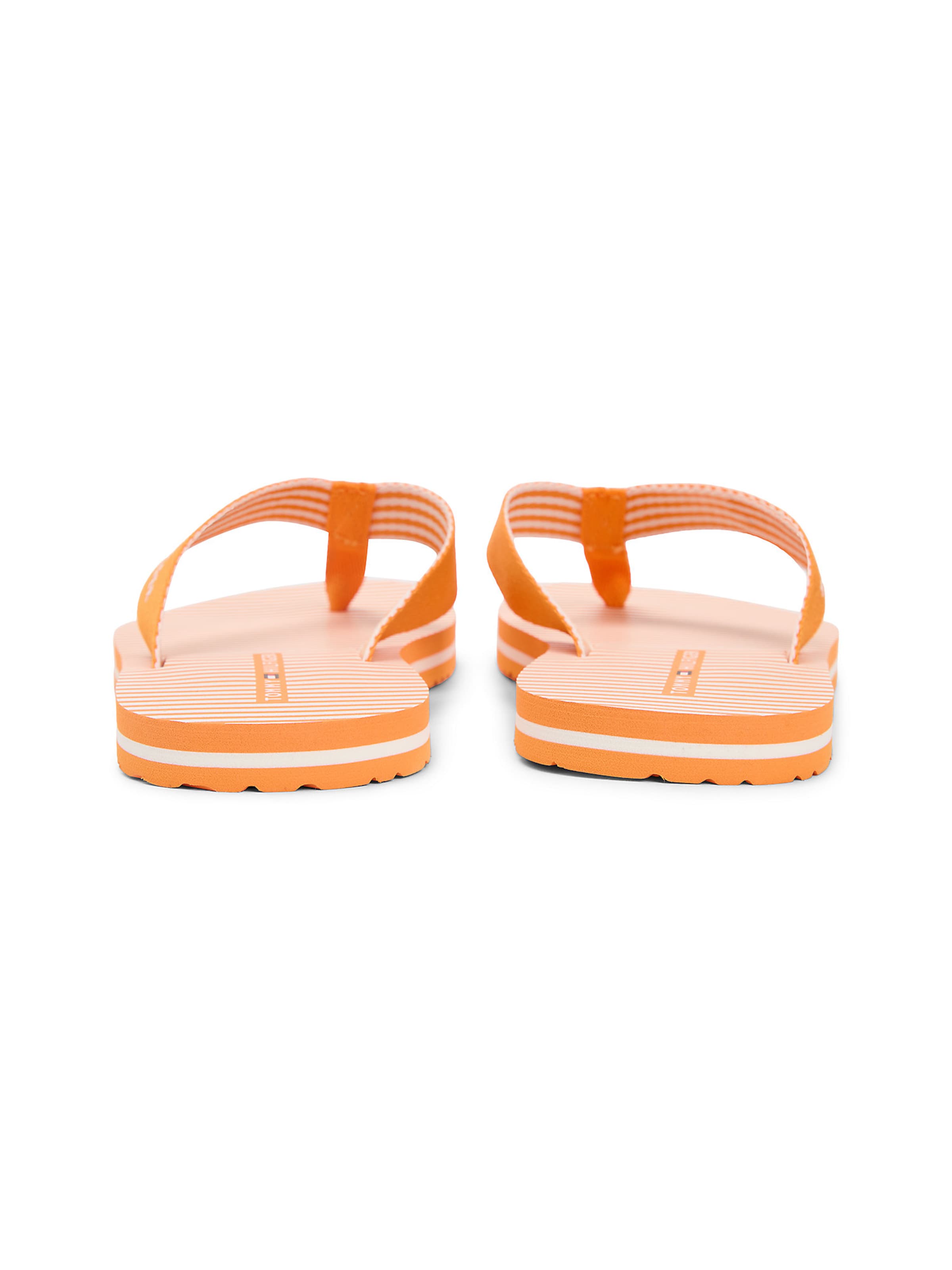TOMMY HILFIGER Teenslipper 'Ithaca' in Oranje