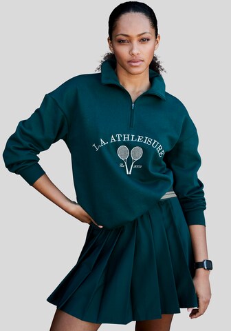 Sweat de sport LASCANA ACTIVE en vert : devant