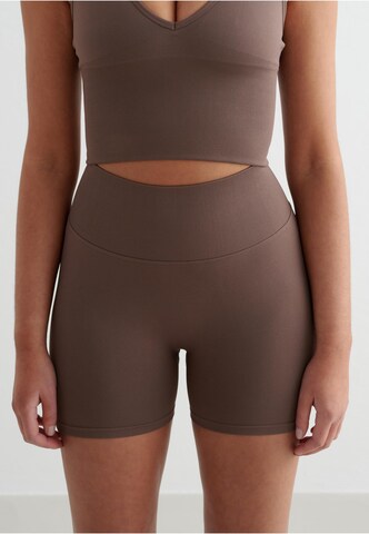 Skinny Pantaloni sportivi di Aim'n in marrone: frontale