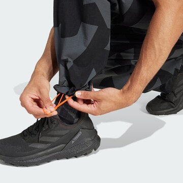 ADIDAS TERREX Loose fit Outdoor trousers 'Xploric' in Black