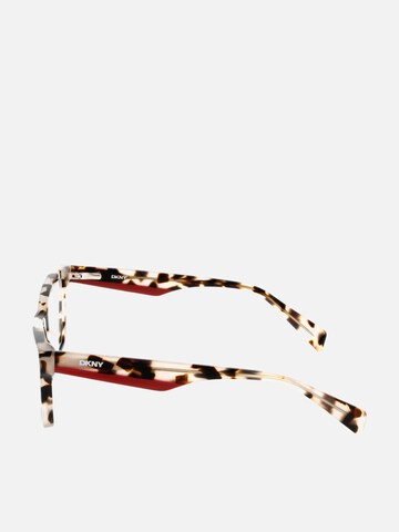 Lunettes de soleil DKNY en beige