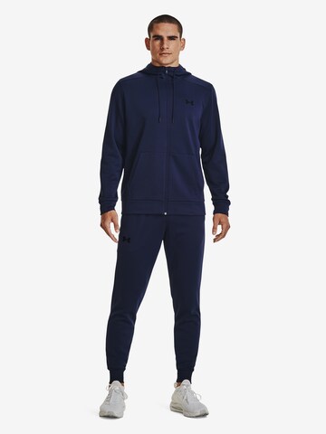 UNDER ARMOUR Tapered Workout Pants in Blue: front