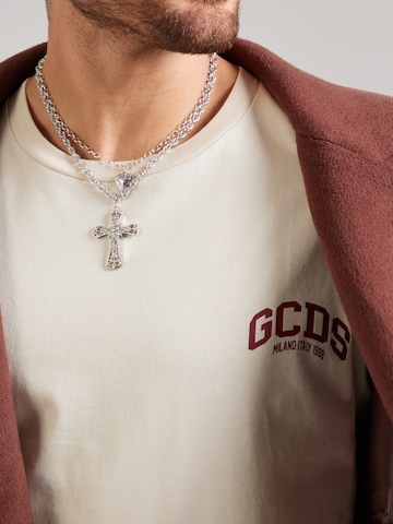 Tricou de la GCDS pe alb