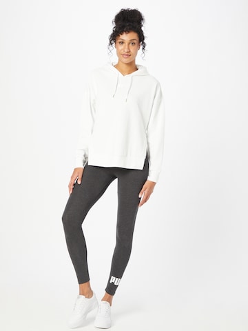 Skinny Pantalon de sport PUMA en gris