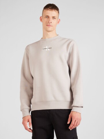 Sweat-shirt Calvin Klein Jeans en beige : devant