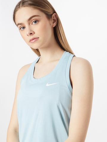 NIKE Спортивный топ в Синий