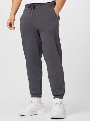 ABOUT YOU Tapered Trousers 'Jake' in Grey: front