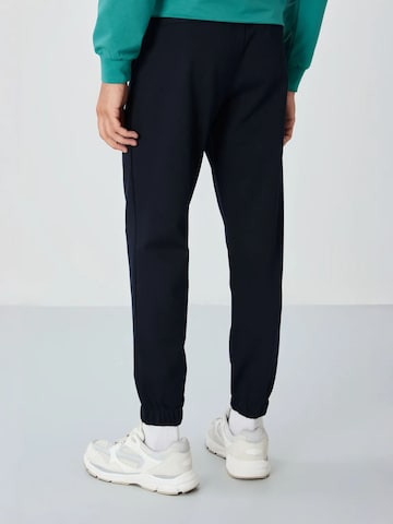 Tommy Life Regular Trousers in Black