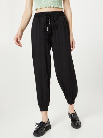 Koton Tapered Harem Pants in Black: front