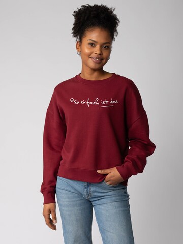 Sweat-shirt 'So einfach ist das' Watapparel en rouge : devant