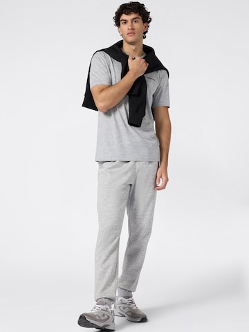 Champion Authentic Athletic Apparel Дънки Tapered Leg Панталон в сиво