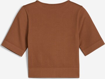 PUMA Shirt 'DARE TO MUTED MOTION' in Brown: front