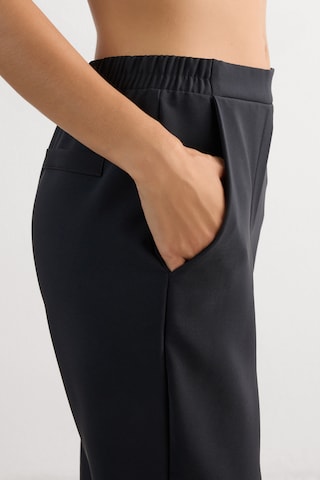 INTIMISSIMI Slimfit Hose in Schwarz