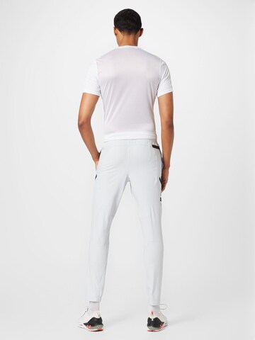 Regular Pantaloni sport 'UNSTOPPABLE' de la UNDER ARMOUR pe gri