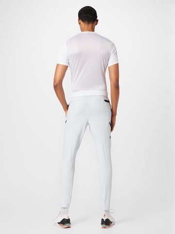 Regular Pantalon de sport 'UNSTOPPABLE' UNDER ARMOUR en gris