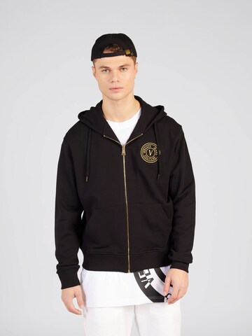 Veste de survêtement Versace Jeans Couture en noir : devant