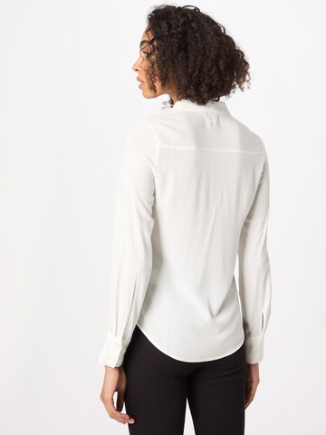 Monki - Blusa en blanco