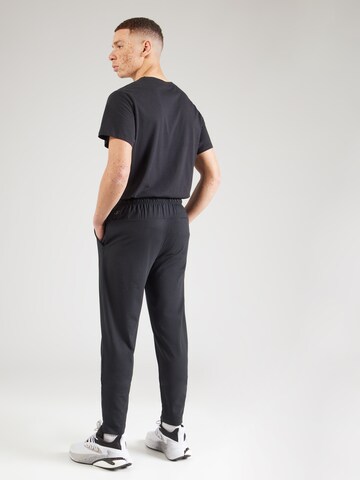Champion Authentic Athletic Apparel - Tapered Pantalón deportivo en negro