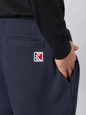 Karl Kani Tapered Trousers 'Signature' in Blue