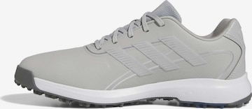 Chaussure de sport ADIDAS GOLF en gris : devant