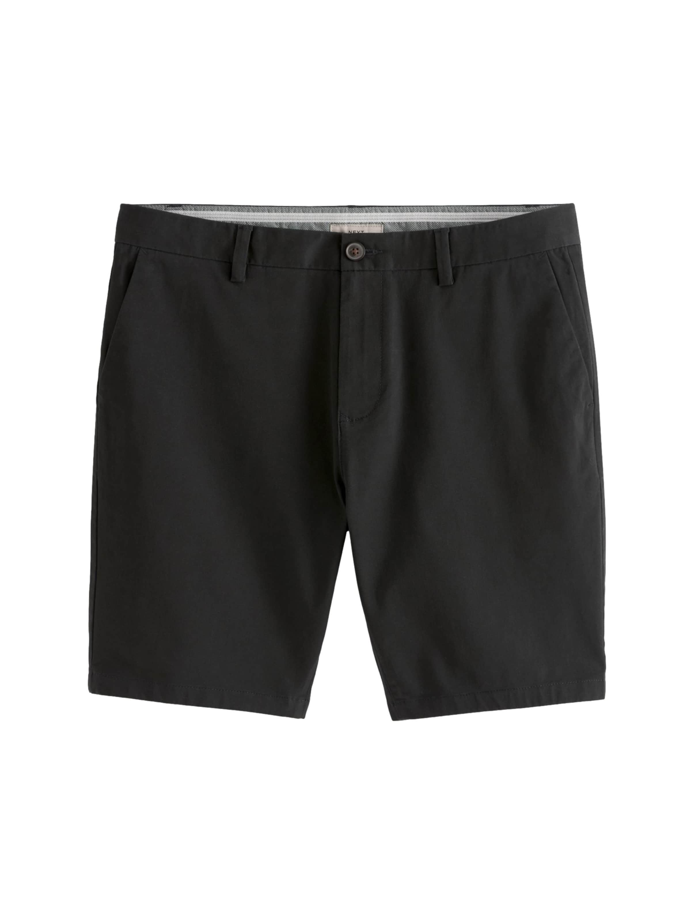 Next Slimfit Chino nadrág - fekete: elől