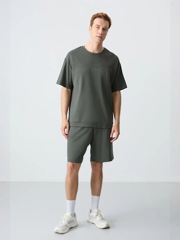 Survêtement Tommy Life en vert : devant