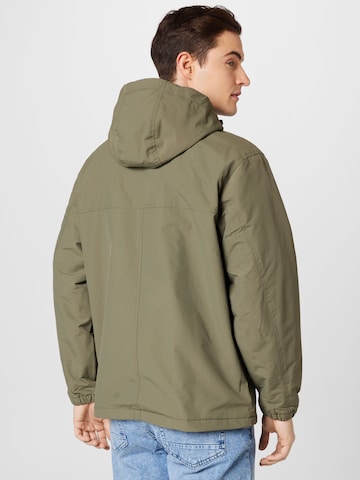 Carhartt WIP Prehodna jakna | zelena barva
