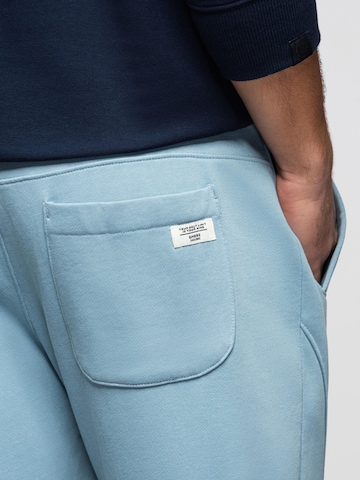Effilé Pantalon de sport Ombre en bleu
